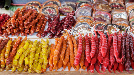 Churchkhela at the street market. Churchkhela georgian national food. Georgian sweets