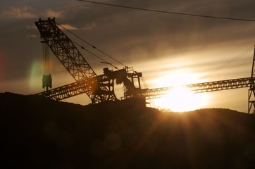 Mining conveyor belts at sunset