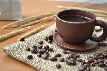 Coffee beans and a cup of coffee