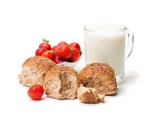 Mini  buns and mug of milk with strawberries isolated on white background