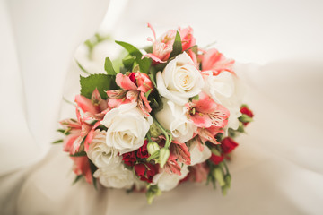 Wonderful luxury wedding bouquet of different flowers