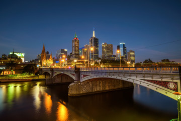 Fototapeta na wymiar Skyline of Melbourne downtown, Princess Bridge and Yarra River at night