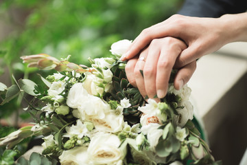 Wonderful luxury wedding bouquet of different flowers