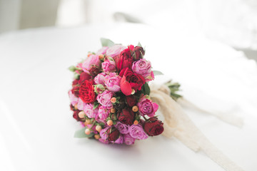 Beautiful luxury wedding bouquet of red flowers