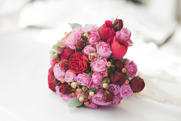 Beautiful luxury wedding bouquet of red flowers