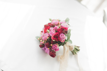 Beautiful luxury wedding bouquet of red flowers