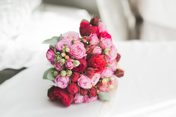 Beautiful luxury wedding bouquet of red flowers