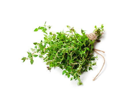 Fresh  bunch of thyme on white table