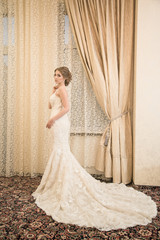 Fototapeta premium beautiful bride posing in luxury wedding dress