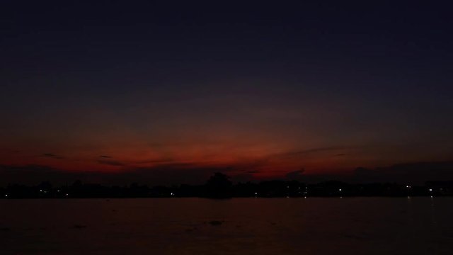 Chaophraya river dusk  to night time lapse shot