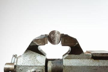 The Russian coin in vise