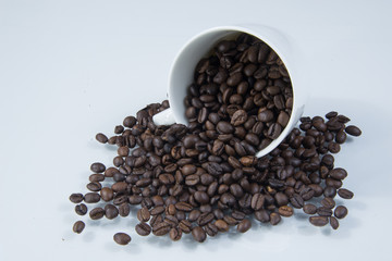 Coffee cup with coffee beans