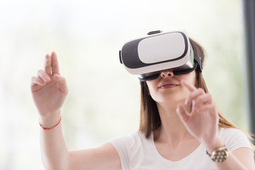 woman using VR-headset glasses of virtual reality