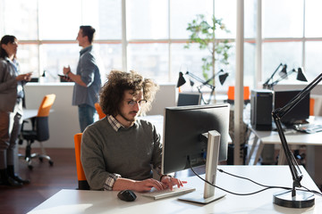 businessman working using a computer in startup office