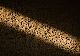 Light on wall in Angkor Wat