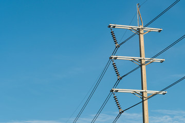 3 phases powerlines pose with blue sky background