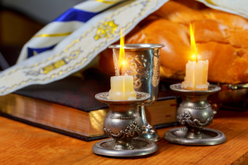 Fototapeta na wymiar Shabbat Shalom Traditional Jewish Sabbath ritual challah bread, wine