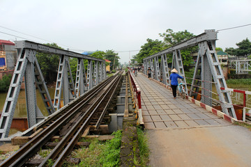 people transportation on the old iron bridge
