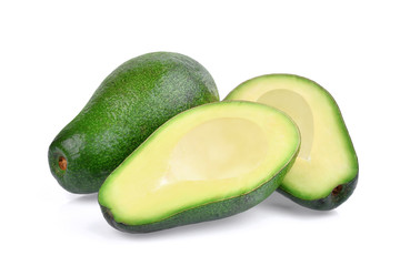 fresh whole and half avocado isolated on white background