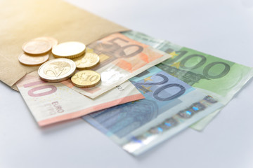 Euro money. banknotes and coins on white background