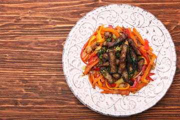 Fried chopped beef with stewed vegetables