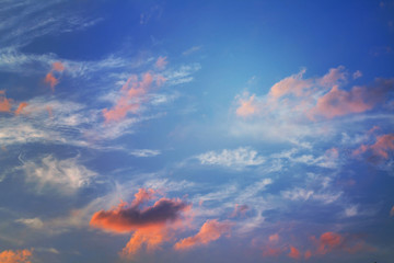Fototapeta na wymiar White, red and orange clouds in the sky