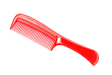 Red comb on white background