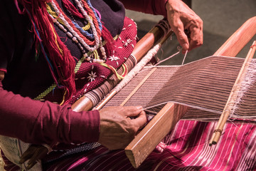 Obraz premium Hill tribe lady weaving