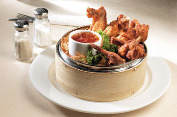 Fried chicken on bamboo basket