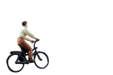 Miniature figure ride bicycle isolated on white background with clipping path