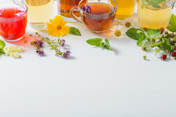 herbal tea in cups on a white background