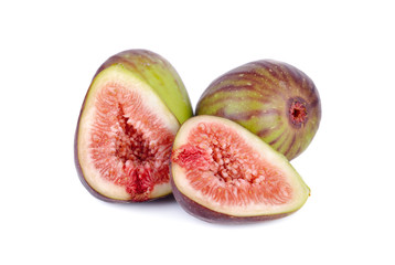 whole and half cut ripe fig on white background