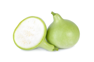 whole and half cut green calabash on white background