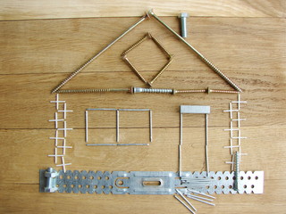 House of screws and bolts. The concept of a modern renovation.