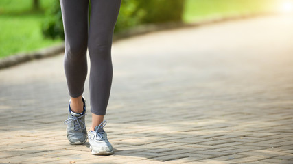 Legs of Woman Jogging Outdoors