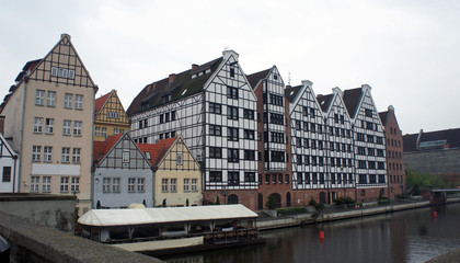 Fototapeta premium Facades of old houses near Motlava river, Gdansk, Poland