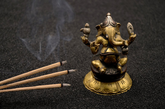 Ganesha on black background close up photo
