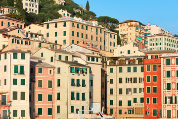 Fototapeta na wymiar Camogli typical village with colorful houses in Italy, Liguria in a sunny day