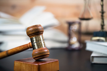 Symbols for balance and power in law and court, selected focus, narrow depth of field