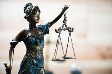 Symbols for balance and power in law and court, selected focus, narrow depth of field
