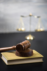 Symbols for balance and power in law and court, selected focus, narrow depth of field
