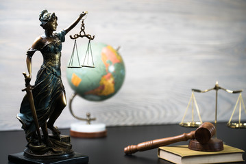 Symbols for balance and power in law and court, selected focus, narrow depth of field