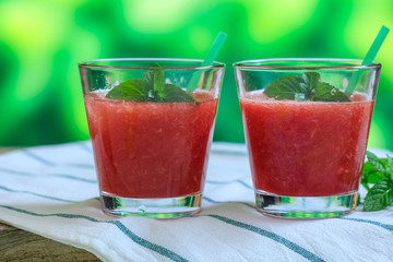Watermelon juices on a wooden table