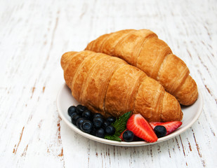 Fresh berries and croissant