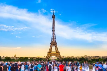 Foto auf Glas Paris Tourist Place / Colorful large group of unrecognizable people blurred in front of Paris Eiffel Tower at evening light (copy space) © 75tiks