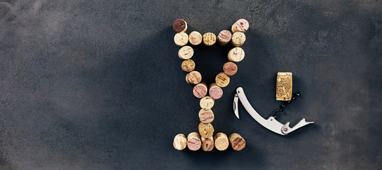 Wine corks arranged in shape of glass