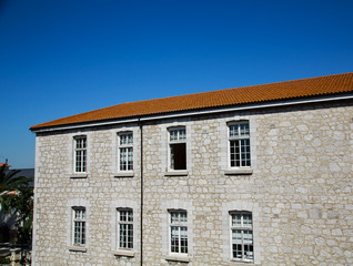 Fototapeta na wymiar Open Window in Stone Building