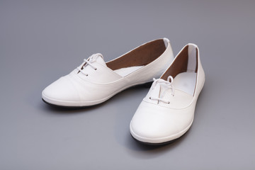 White Shoes isolated on gray background