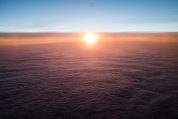 Obraz premium Sunrise from Airplane 