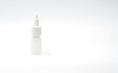 Plastic bottle of nasal spray medicine with blank label isolated on white background